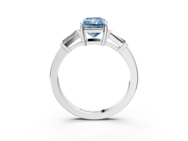 White gold Fancy Blue Radiant  Cut Diamond Ring with Tapered Baguette Side Stones in Four-Prong Setting