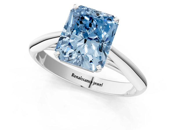 White gold Fancy Blue Radiant Cut Diamond Solitaire Engagement Ring with Cathedral Setting and Four-Prong Mount