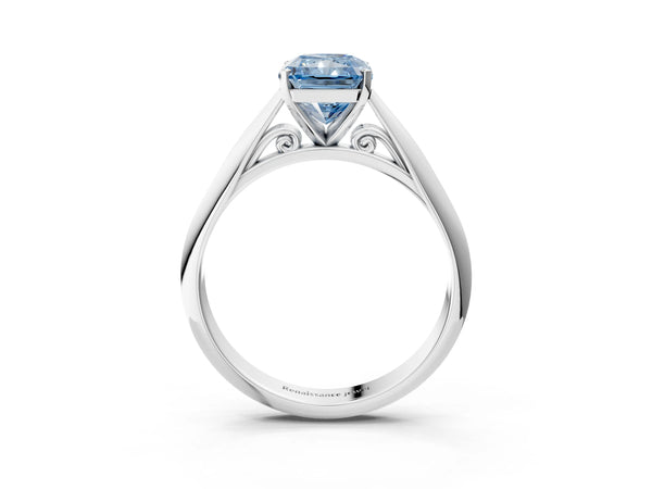 White gold Fancy Blue Radiant Cut Diamond Solitaire Engagement Ring with Cathedral Setting and Four-Prong Mount