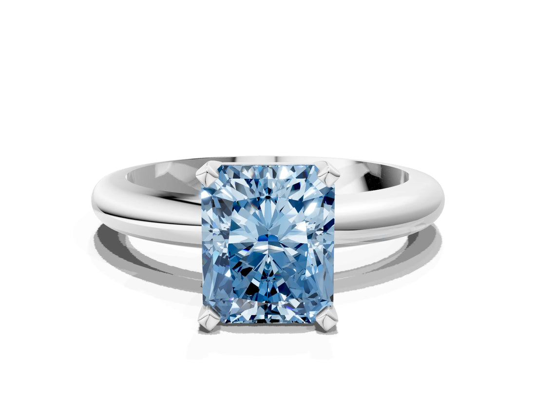 White gold Fancy Blue Radiant Cut Diamond Solitaire Engagement Ring with Round Band and Four-Prong Setting_179