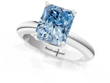 White gold Fancy Blue Radiant Cut Diamond Solitaire Engagement Ring with Round Band and Four-Prong Setting_180