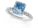 White gold Fancy Blue Radiant Cut Diamond Solitaire Pavé Engagement Ring with Round Band and Prong Setting_99