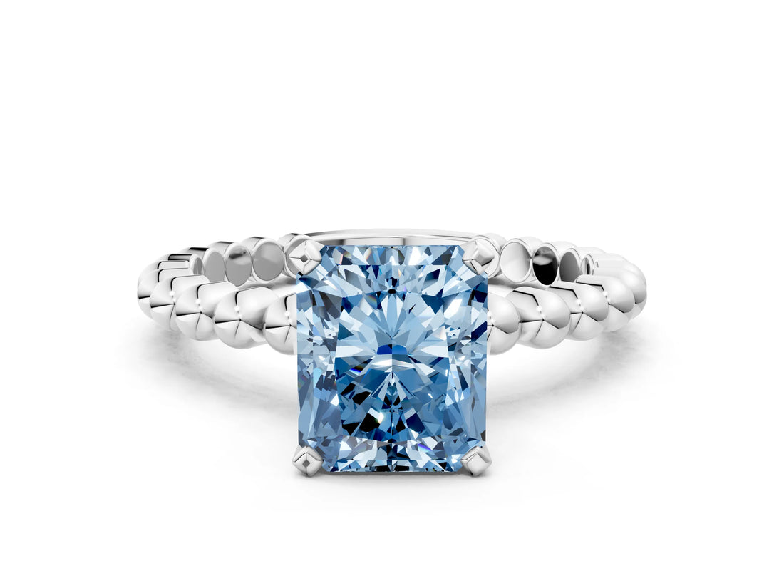 White gold Fancy Blue Radiant Cut Diamond Solitaire Ring with Beaded Band and Prong Setting_389