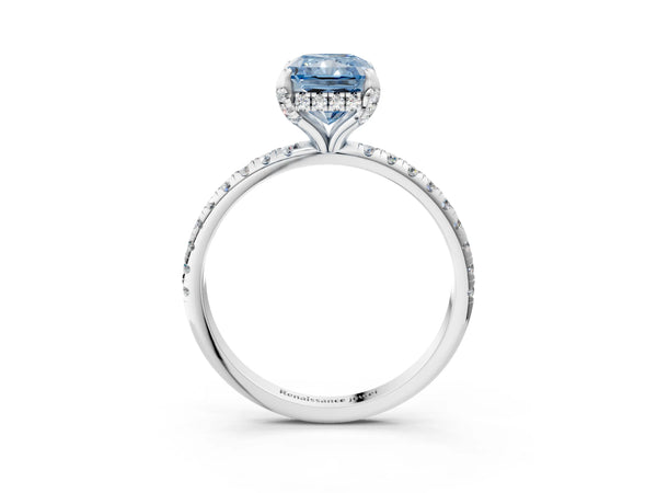 White gold Fancy Blue Radiant Cut Diamond Solitaire Ring with Four-Prong Setting and Pavé Band