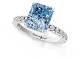 White gold Fancy Blue Radiant Cut Diamond Solitaire Ring with Pavé Band and Four-Prong Setting_65