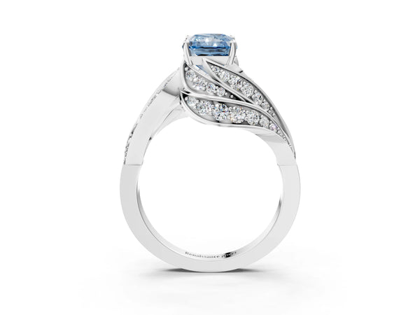 White gold Fancy Blue Radiant Cut Diamond Solitaire Ring with Prong Setting and Twisted Pavé Band