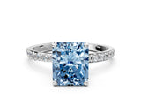 White gold Fancy Blue Radiant Cut Diamond Solitaire Ring with Round  Pavé Band and Prong Setting_173