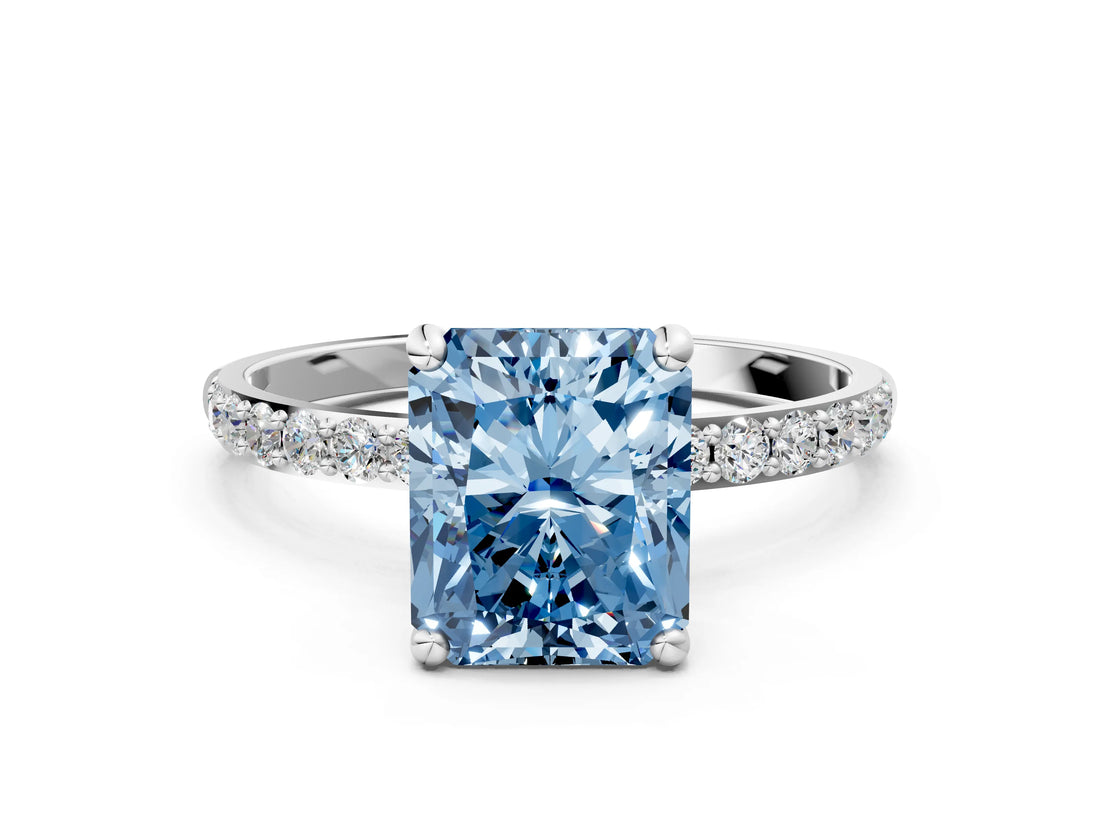 White gold Fancy Blue Radiant Cut Diamond Solitaire Ring with Round  Pavé Band and Prong Setting_180