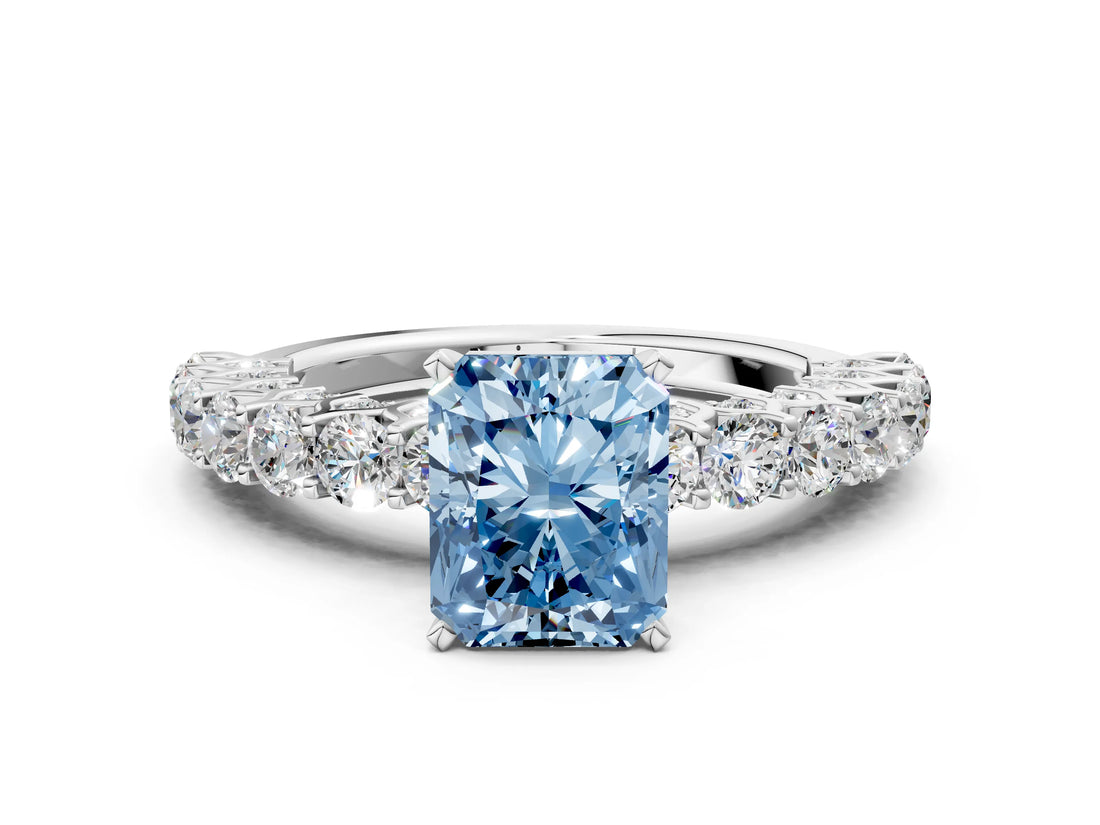 White gold Fancy Blue Radiant Cut Diamond Solitaire Ring with Shared Prong Pavé Band and Four-Prong Setting_69
