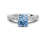 White gold Fancy Blue Radiant Cut Diamond Solitaire Ring with Shared Prong Pavé Band and Four-Prong Setting_69