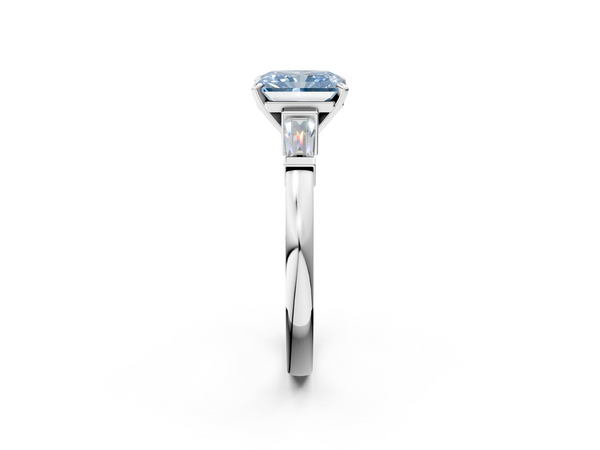 White gold Fancy Blue Radiant  Cut Diamond Solitaire Ring with Tapered Baguette Accents and Four-Prong Setting