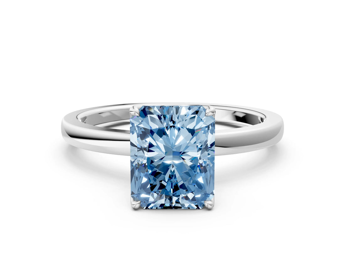 White gold Fancy Blue Radiant Cut Diamond Solitaire Ring with Thin Band and Prong Setting_42