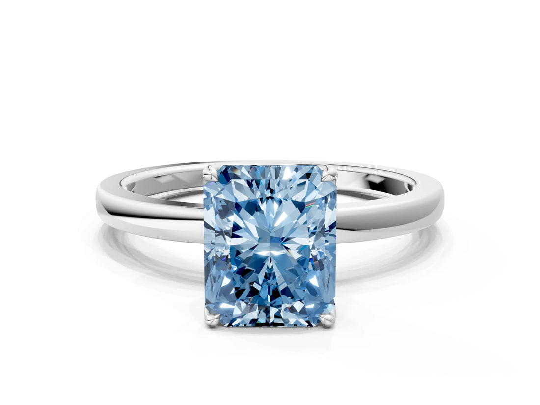 White gold Fancy Blue Radiant Cut Diamond Solitaire Ring with Thin Band and Prong Setting_66