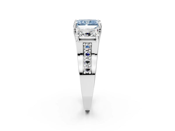 White gold Fancy Blue Radiant Cut Diamond Three-Stone Ring with Channel Set Band and Four-Prong Setting