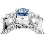 White gold Fancy Blue Radiant Cut Diamond Three-Stone Ring with Channel Set Band and Four-Prong Setting_135