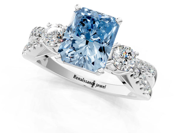 Platinum Fancy Blue Radiant Cut Diamond Three-Stone Ring with Pavé Split Shank and Four-Prong Setting