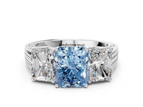 White gold Fancy Blue Radiant Cut Diamond Three-Stone Ring with Prong Setting and Textured Band