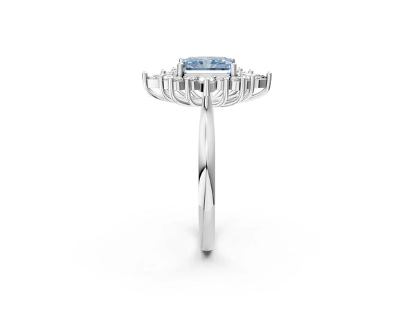 White gold Fancy Blue Radiant Cut Halo Diamond Cluster Ring with Marquise and Round Stones on a White Gold Band with Prong Setting