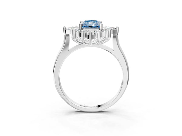 White gold Fancy Blue Radiant Cut Halo Diamond Cluster Ring with Marquise and Round Stones on a White Gold Band with Prong Setting