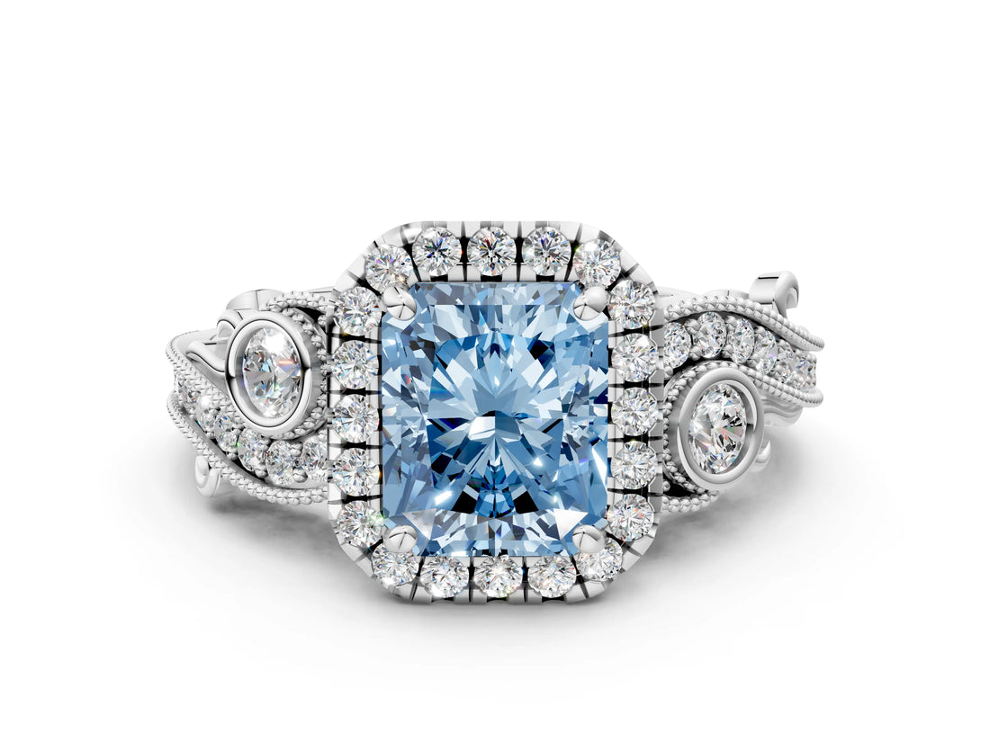 White gold Fancy Blue Radiant Cut Halo Diamond Ring with Milgrain and Bezel Accents on a Split Shank Band_12