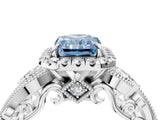 White gold Fancy Blue Radiant Cut Halo Diamond Ring with Milgrain and Bezel Accents on a Split Shank Band_16