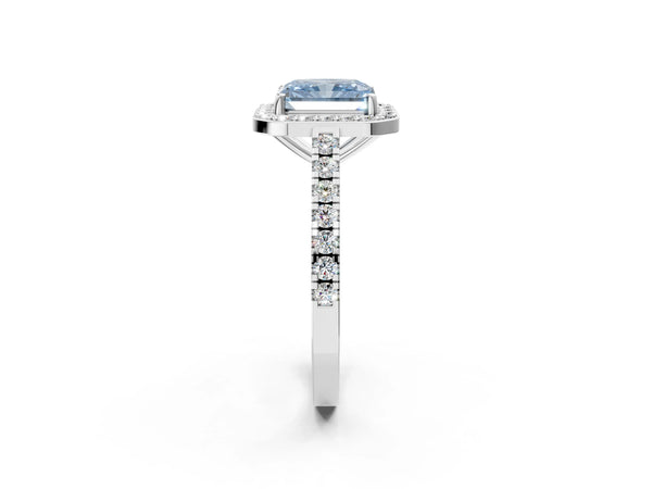 Platinum Fancy Blue Radiant Cut Halo Diamond Ring with Pavé Band and Three-Prong Setting