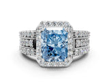 White gold Fancy Blue Radiant Cut Halo Diamond Ring with Round  Split Shank and Prong Setting_111