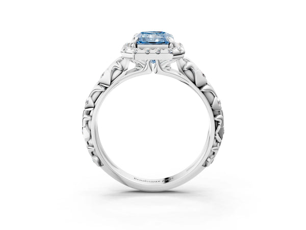 White gold Fancy Blue Radiant Cut Halo Diamond Solitaire with Filigree Band and Four-Prong Setting