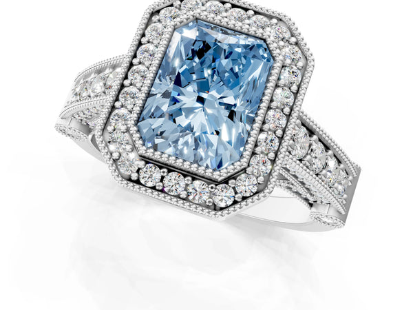 White gold Fancy Blue Radiant Cut Halo Diamond Split Shank Pave Ring