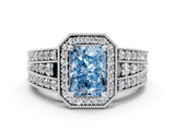 White gold Fancy Blue Radiant Cut Halo Diamond Split Shank Ring with Prong Setting