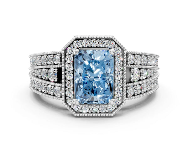 White gold Fancy Blue Radiant Cut Halo Diamond Split Shank Ring with Prong Setting