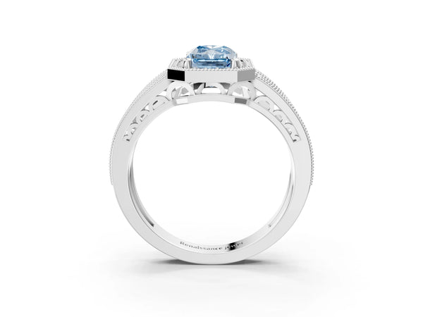 White gold Fancy Blue Radiant Cut Halo Diamond Split Shank Ring with Prong Setting