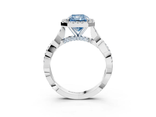 Platinum Fancy Blue Radiant Cut Halo Twist Band with Four-Prong Setting