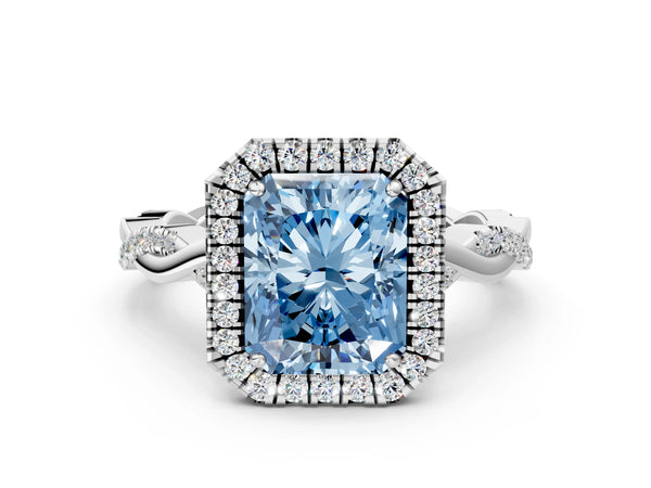 Platinum Fancy Blue Radiant Cut Halo Twist Band with Four-Prong Setting