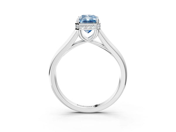 White gold Fancy Blue Radiant Cut Solitaire Diamond Engagement Ring with Four-Prong Setting and Tapered Band