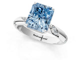 White gold Fancy Blue Radiant Cut Solitaire Diamond Engagement Ring with Twisted Pave Band and Four-Prong Setting_56