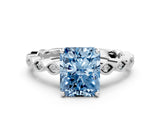 White gold Fancy Blue Radiant Cut Solitaire Diamond Ring with Infinity Twist Band and Four-Prong Setting_12