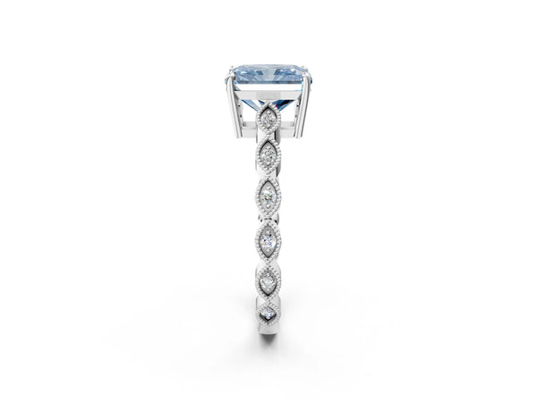 White gold Fancy Blue Radiant Cut Solitaire Diamond Ring with Infinity Twist Band and Four-Prong Setting