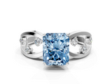 White gold Fancy Blue Radiant  Cut Solitaire Diamond with Side Stones on Criss-Cross Band and Four-Prong Setting_3