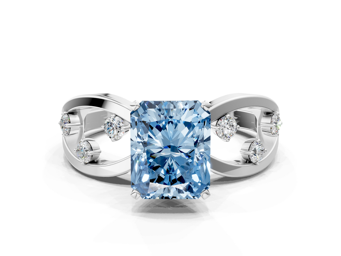 White gold Fancy Blue Radiant  Cut Solitaire Diamond with Side Stones on Criss-Cross Band and Four-Prong Setting_3