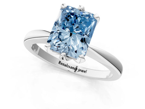 White gold Fancy Blue Radiant Cut Solitaire Engagement Ring with Six-Prong Setting and Tapered Band_1