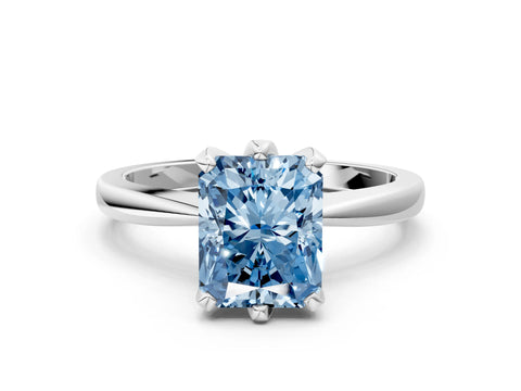 White gold Fancy Blue Radiant Cut Solitaire Engagement Ring with Six-Prong Setting and Tapered Band