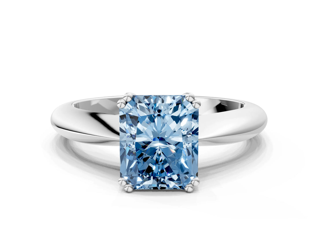 White gold Fancy Blue Radiant  Cut Solitaire Engagement Ring with Tapered Band and Four-Prong Setting