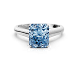White gold Fancy Blue Radiant Cut Solitaire Engagement Ring with Tapered Band and Four-Prong Setting_15