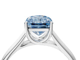 White gold Fancy Blue Radiant Cut Solitaire Engagement Ring with Tapered Band and Four-Prong Setting_19