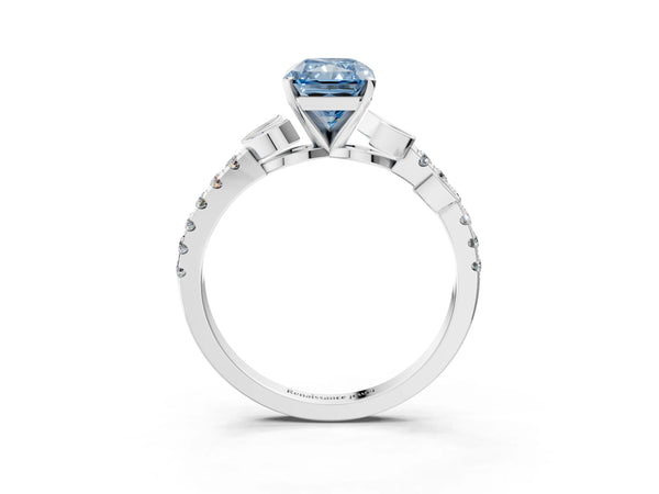 Platinum Fancy Blue Radiant Cut Solitaire Leaf-Inspired Diamond Ring with Pavé Band and Four-Prong Setting