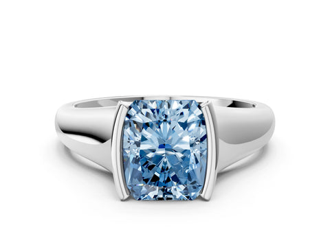 White gold Fancy Blue Radiant Cut Solitaire Tension Set Diamond Ring with Split Shank Band