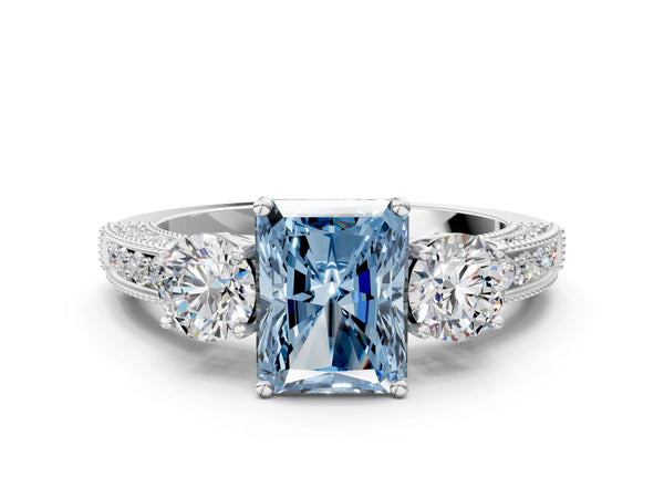 White gold Fancy Blue Radiant Cut Three-Stone Diamond Ring with Pavé Band and Four-Prong Setting