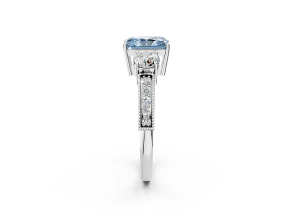 White gold Fancy Blue Radiant Cut Three-Stone Diamond Ring with Pavé Band and Four-Prong Setting