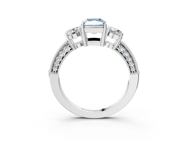 White gold Fancy Blue Radiant Cut Three-Stone Diamond Ring with Pavé Band and Four-Prong Setting